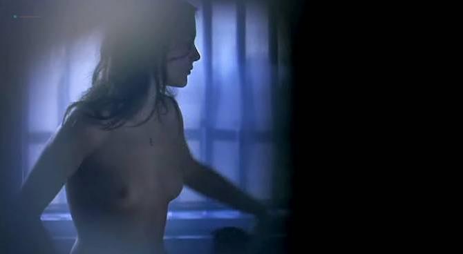   Virginie Ledoyen in nude scene from De lamour which was released in 2001. She shows us her tits in sex scene. 